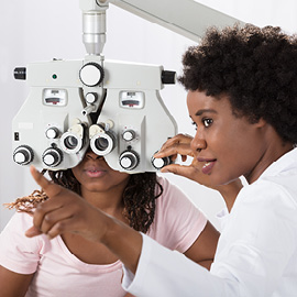 Optometrist doing an eye exam