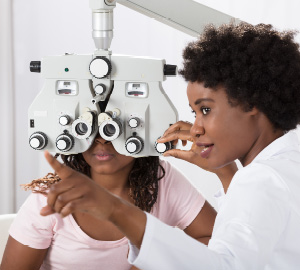 Optometrist doing an eye exam