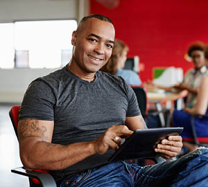 Young male veteran working on an iPad