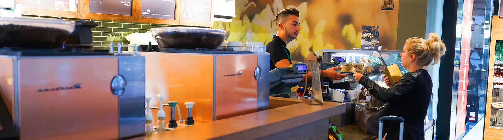 Barista taking a payment