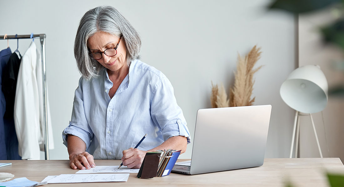 How to get a business loan - photo of a older woman fashion designer
