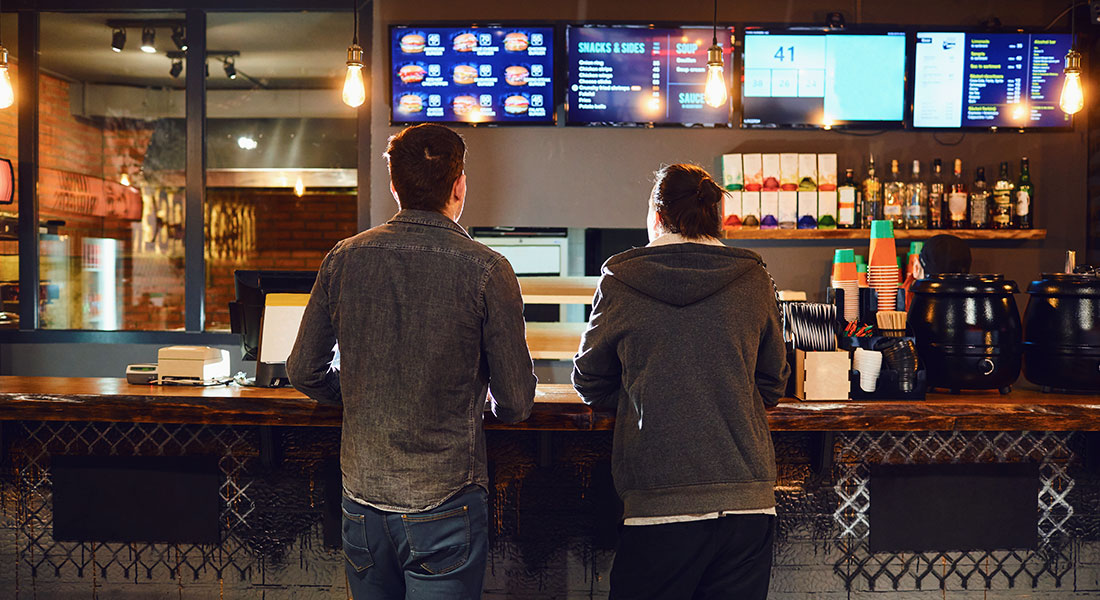 Franchise restaurant customers at the counter