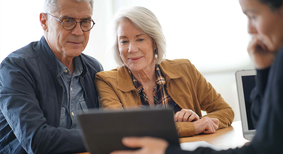 Seniors looking at a tablet - Compound Interest Calculator
