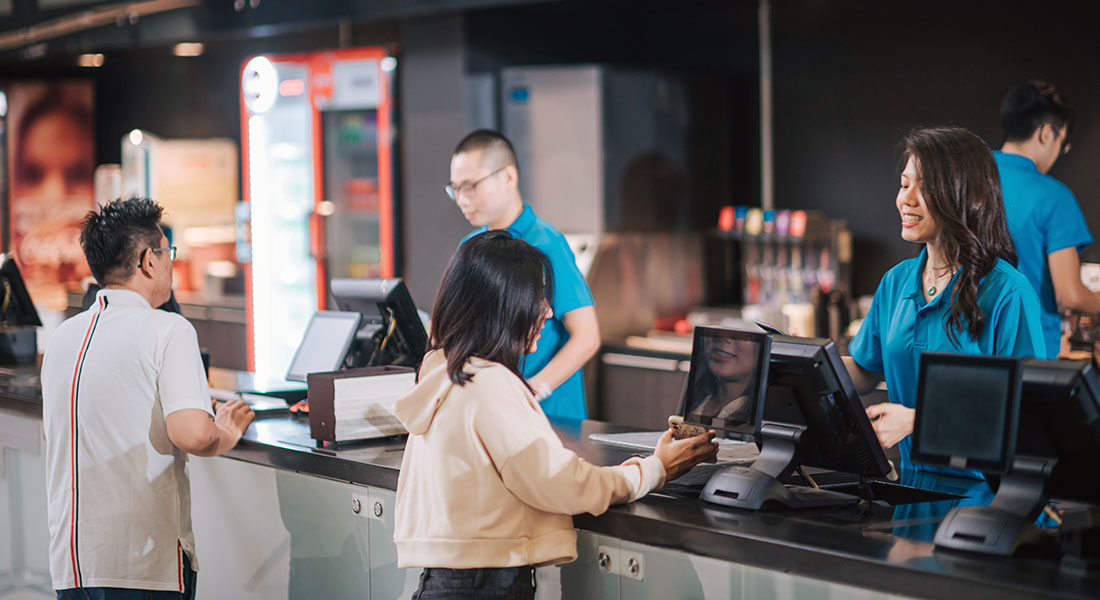 Customers purchasing food at the counter - Franchise Model